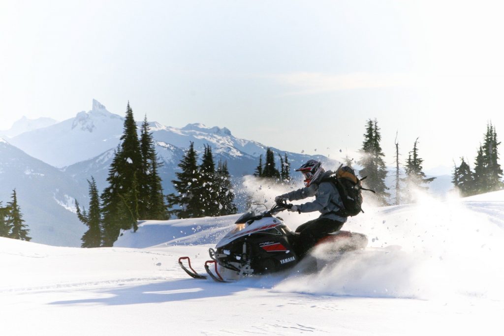 Canadian Wilderness Adventure's snowmobile fondue trip is a 'Canadian Signature Experience'.