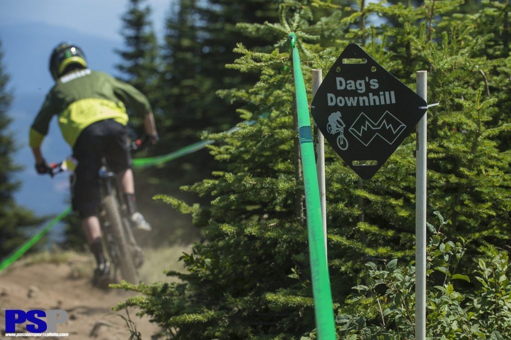 Biker riding the Dag's Downhill trail at Silver Star.