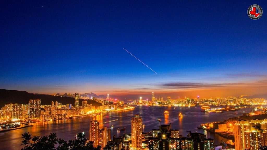 The illuminated Hong Kong skyline captured at night.