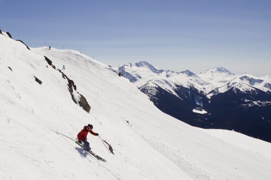 Carving the slopes on a perfect spring skiing day in Whistler.