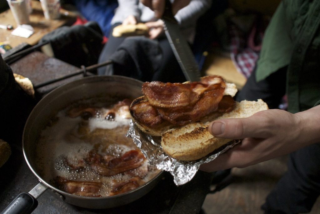 Bacon is served at the hut.