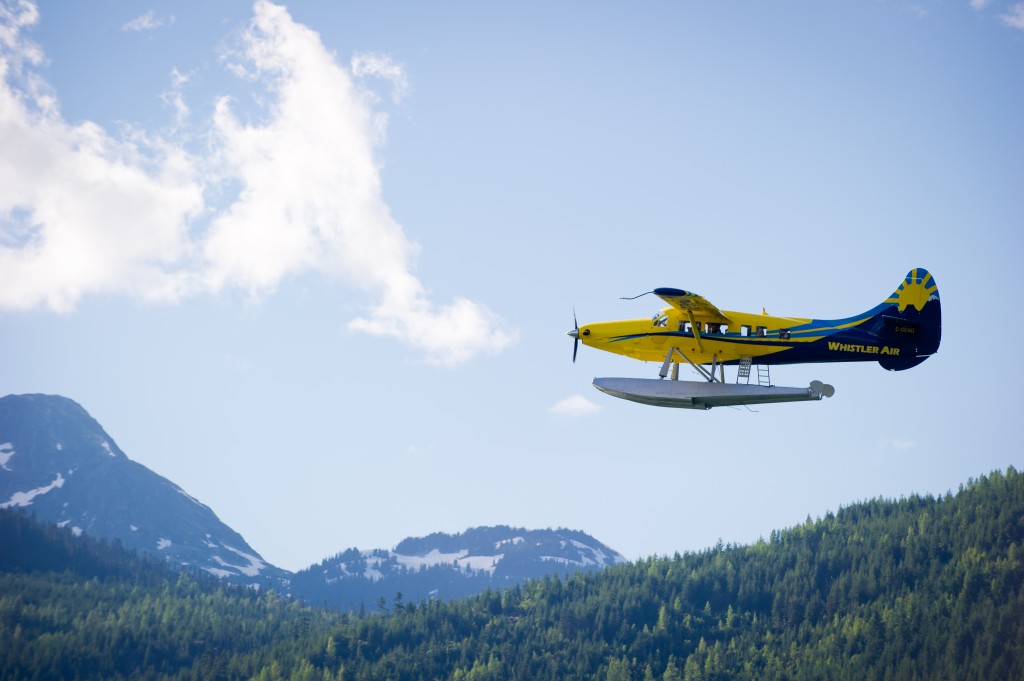 A float plane flying above Whistler.