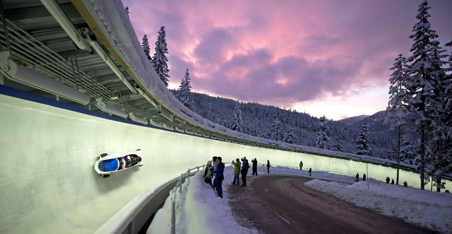 Bobsleigh track at night.