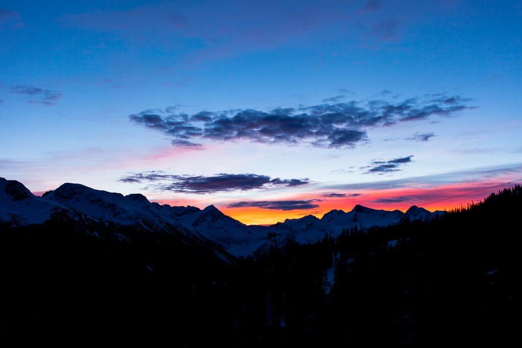 A sunset behind the mountains of Whistler.